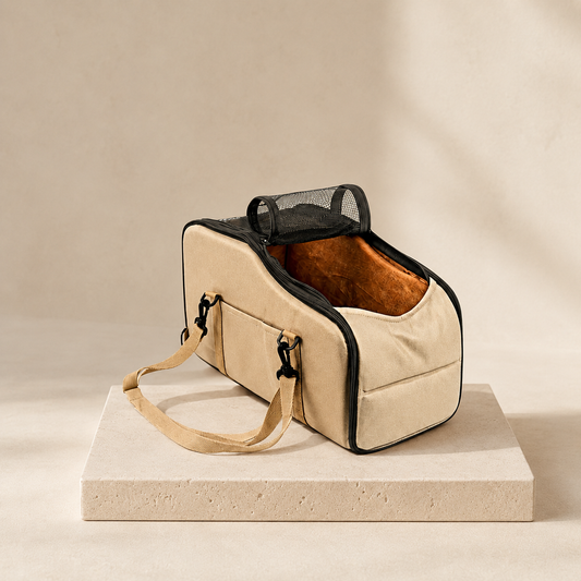 Voyage cream portable pet carrier on a travertine plinth