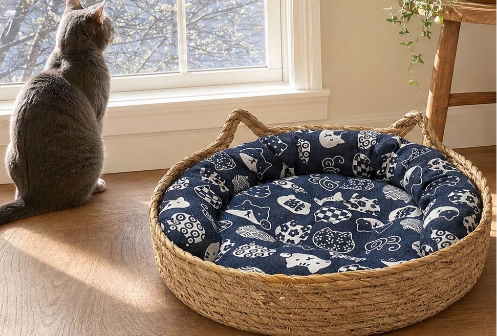 Nami woven basket bed showing the cat-ear silhouette and raised sides