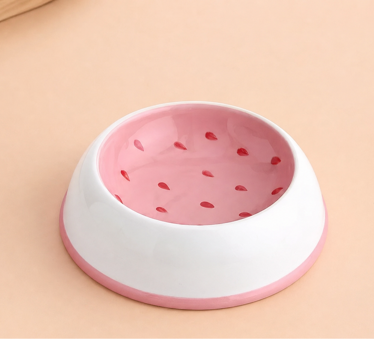 Frutta pumpkin-shaped ceramic pet bowl on a neutral surface
