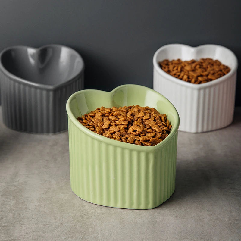 Mira tilted ceramic cat bowl shown from the side