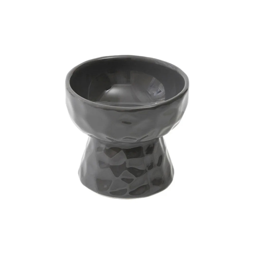 Sora pedestal pet bowl showing the textured sculptural base