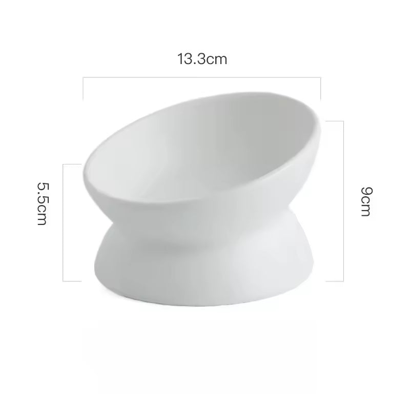 Lumi tilted ceramic pet bowl in white