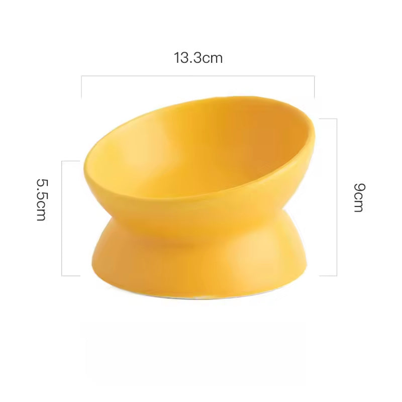 Lumi tilted ceramic pet bowl in yellow
